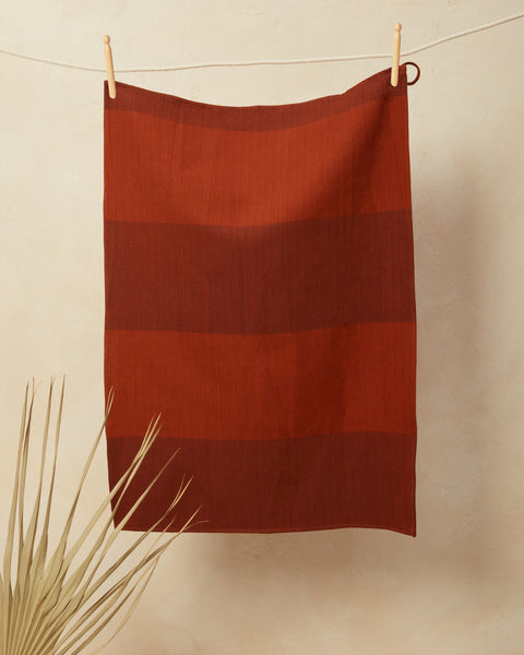 https://www.minna-goods.com/cdn/shop/products/Sol-Tea-Towel-Rust-styled_grande.jpg?v=1636047946